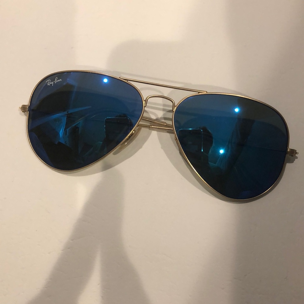 blue reflective with gold rim ray bans